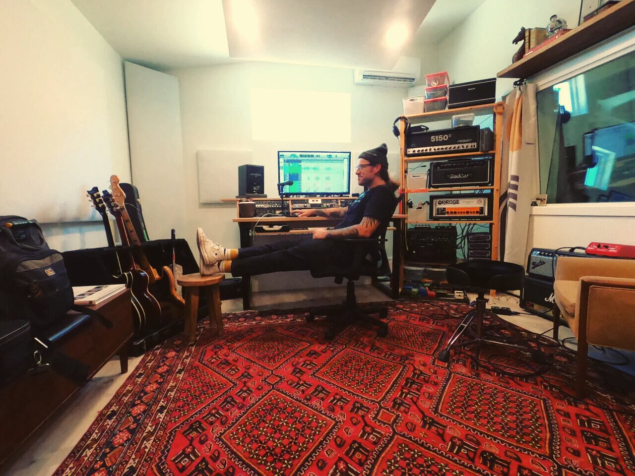 The Vibeatorium recording studio with vintage gear and warm lighting